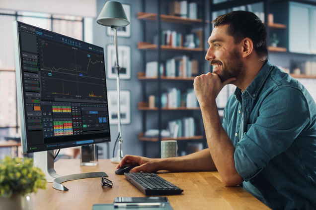 Handsome Caucasian Specialist Using Desktop Computer with Clothi
