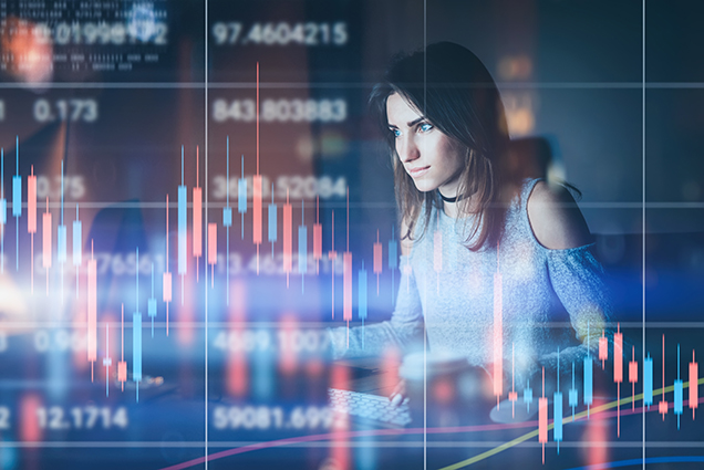 Young woman traider working at night modern office.Technical price graph and indicator, red and green candlestick chart and stock trading computer screen background. Double exposure.